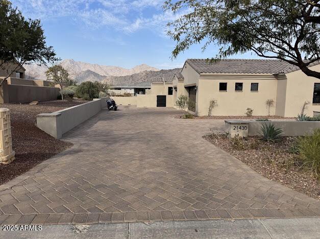 exterior space featuring a mountain view