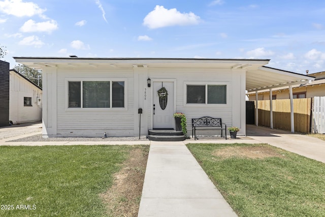5808 W Myrtle Ave, Glendale, AZ 85301 - view of front of property with a carport and concrete driveway