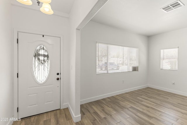5808 W Myrtle Ave, Glendale, AZ 85301 - foyer entrance with light wood-type flooring and baseboards