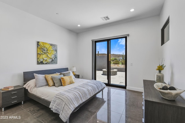 tiled bedroom with access to exterior