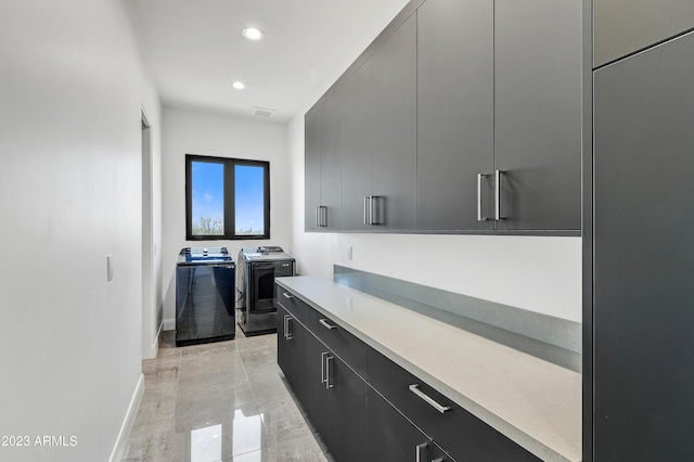 kitchen featuring washer and clothes dryer