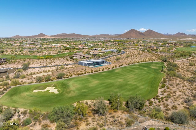 birds eye view of property featuring a mountain view