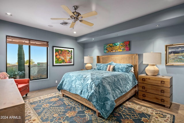 carpeted bedroom with ceiling fan