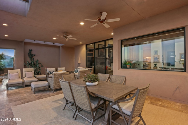 view of patio featuring an outdoor hangout area and ceiling fan