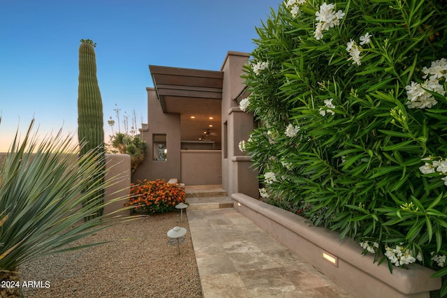 view of property exterior at dusk