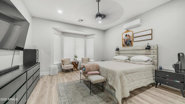 3103 S Benton, Mesa, AZ 85212 - bedroom with a wall mounted AC, light wood finished floors, recessed lighting, and baseboards