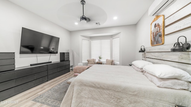 3103 S Benton, Mesa, AZ 85212 - bedroom featuring a wall mounted AC, wood finished floors, recessed lighting, and a ceiling fan