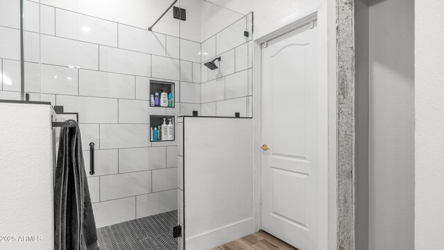 3103 S Benton, Mesa, AZ 85212 - bathroom featuring a shower stall, wood finished floors, and baseboards