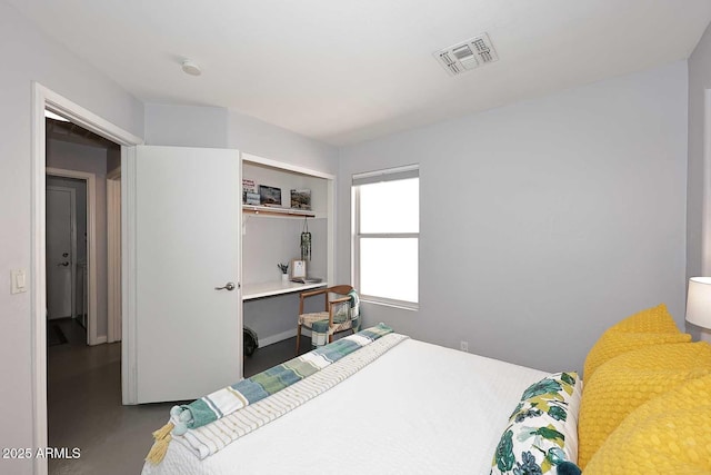 3122 E Kristal Way, Phoenix, AZ 85050 - bedroom featuring finished concrete floors