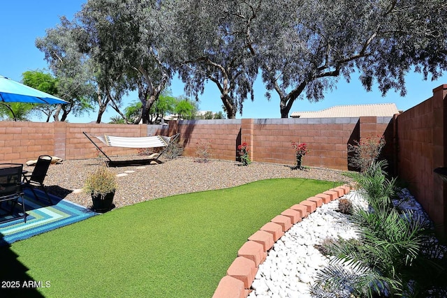 3122 E Kristal Way, Phoenix, AZ 85050 - fenced backyard with a patio area