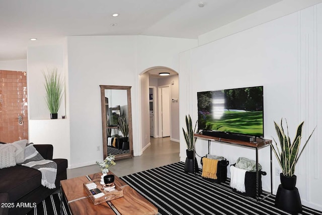3122 E Kristal Way, Phoenix, AZ 85050 - living area with arched walkways, recessed lighting, and baseboards