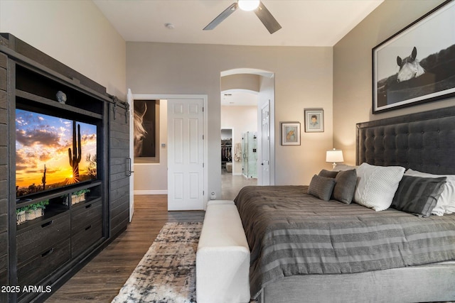 bedroom with dark wood-type flooring and ceiling fan