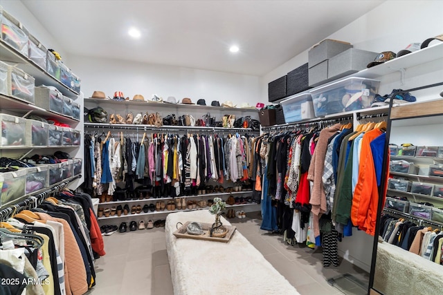 walk in closet featuring light tile patterned floors