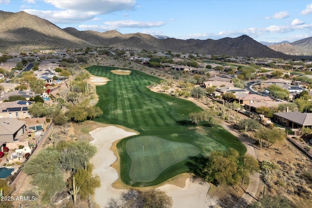 birds eye view of property featuring a mountain view