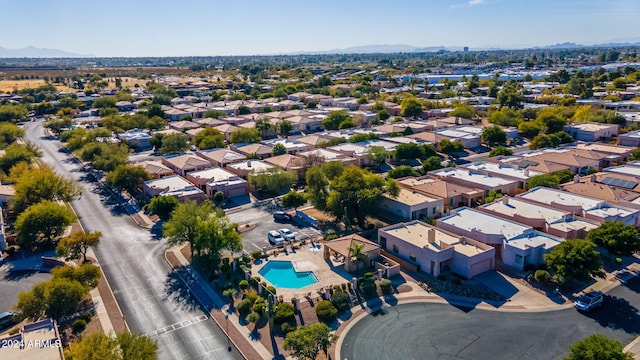 birds eye view of property featuring a mountain view