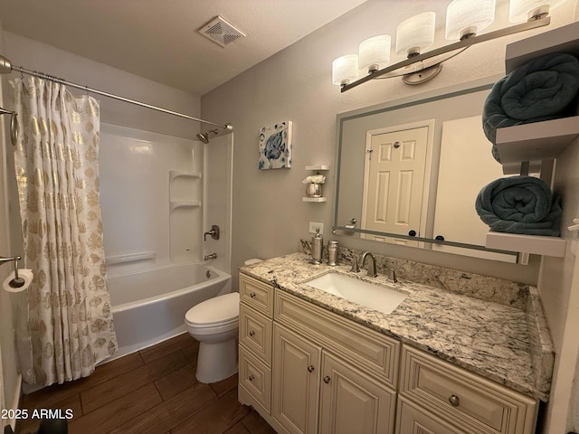 3145 W Acoma Dr, Phoenix, AZ 85053 - full bathroom with wood finished floors, vanity, and shower / bathtub combination with curtain