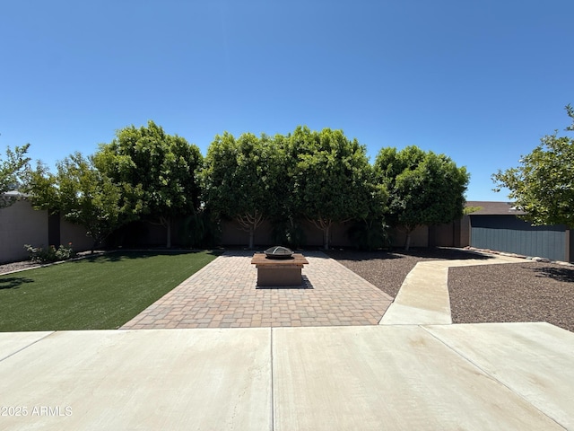 3145 W Acoma Dr, Phoenix, AZ 85053 - view of front facade featuring a fire pit and a patio area