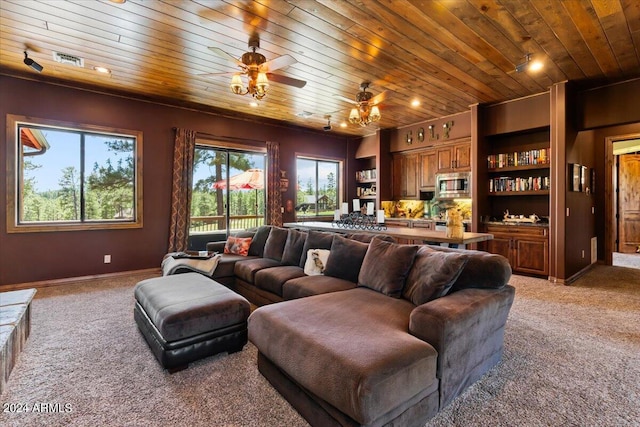 living room with wood ceiling, light carpet, and a ceiling fan