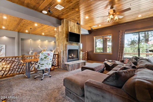 living room featuring wooden ceiling, carpet floors, a fireplace, and ceiling fan