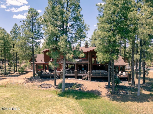 view of yard with a wooden deck
