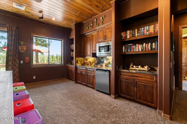 bar with dishwashing machine, stainless steel microwave, wooden ceiling, light colored carpet, and baseboards