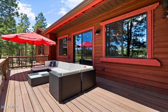wooden deck with an outdoor hangout area