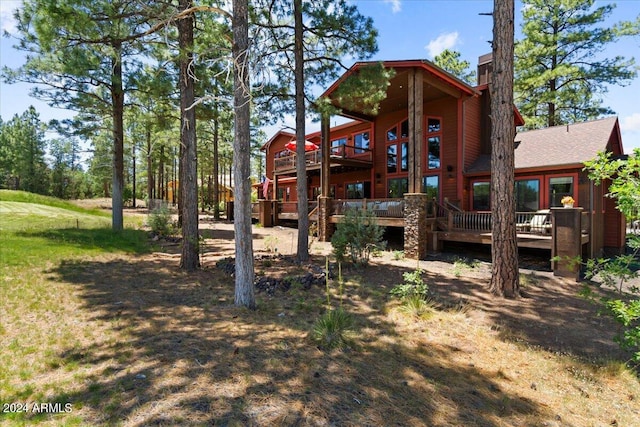 view of yard featuring a wooden deck