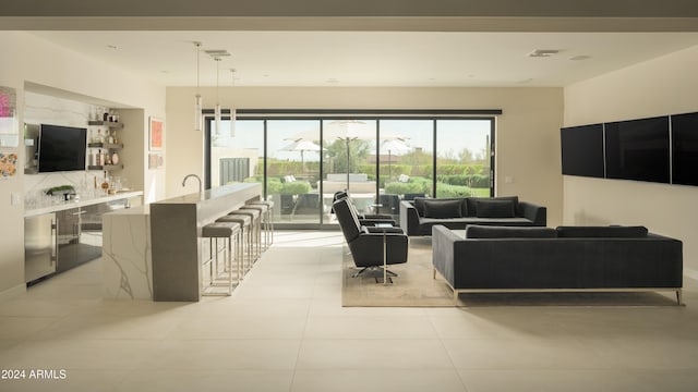 living room featuring light tile patterned floors