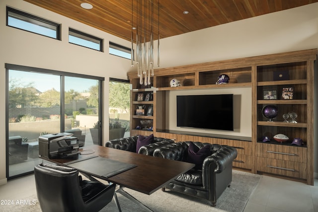 office featuring wood ceiling, a high ceiling, and light tile patterned floors