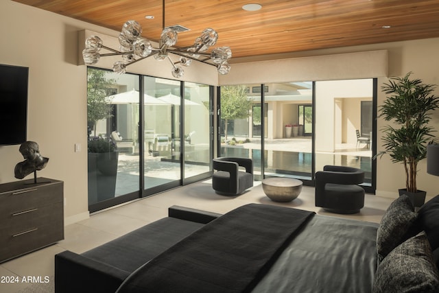 living room featuring wood ceiling and an inviting chandelier