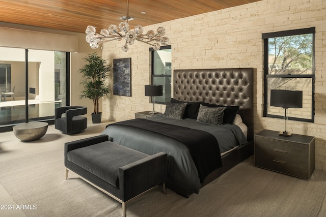 bedroom with wood ceiling and a chandelier