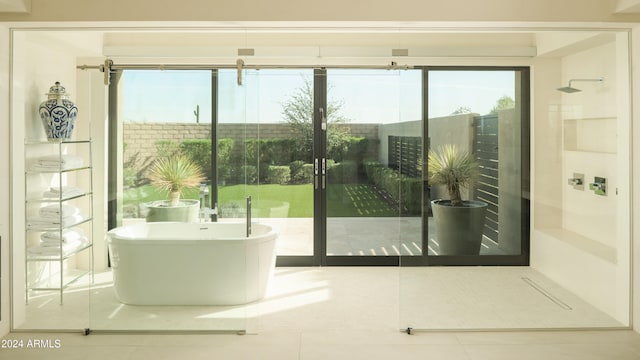 doorway to outside with tile patterned floors