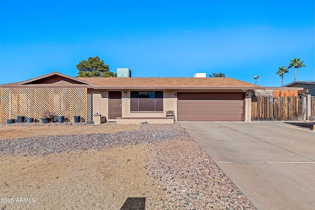 ranch-style house featuring a garage