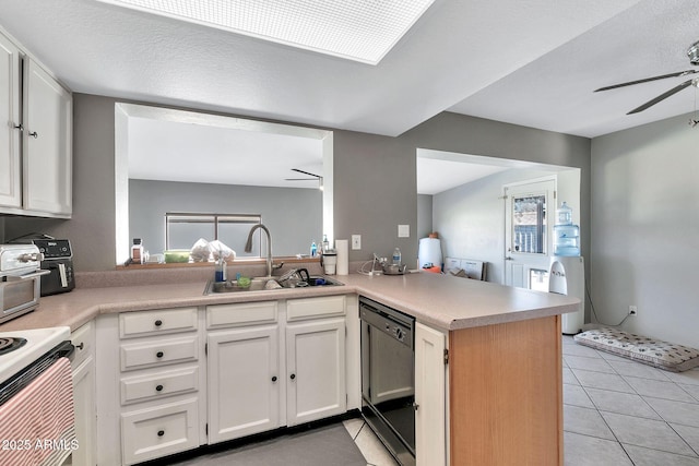 kitchen featuring sink, kitchen peninsula, black dishwasher, light tile patterned flooring, and white cabinetry