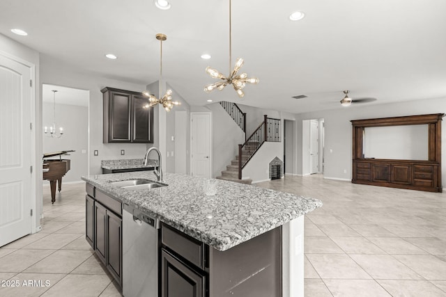 18740 W San Juan Ave, Litchfield Park, AZ 85340 - kitchen featuring stainless steel dishwasher, a chandelier, a sink, light tile patterned flooring, and recessed lighting
