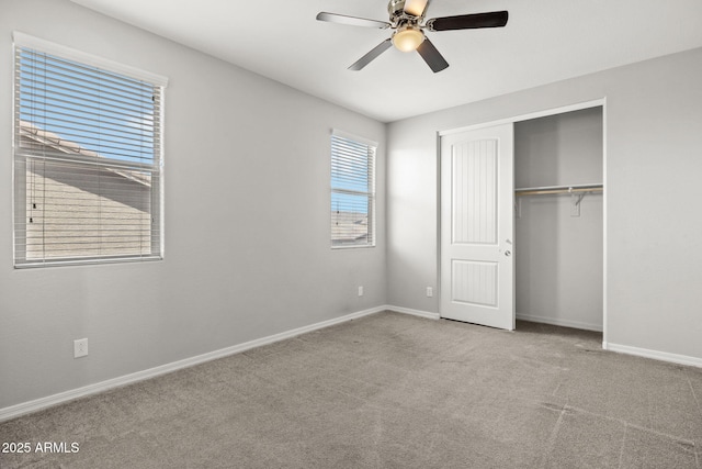 18740 W San Juan Ave, Litchfield Park, AZ 85340 - unfurnished bedroom featuring baseboards, a closet, carpet flooring, and ceiling fan