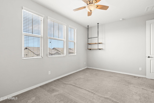 18740 W San Juan Ave, Litchfield Park, AZ 85340 - carpeted empty room with baseboards and ceiling fan