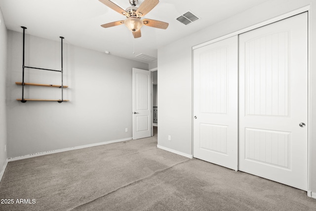 18740 W San Juan Ave, Litchfield Park, AZ 85340 - unfurnished bedroom featuring carpet flooring, baseboards, a closet, and a ceiling fan