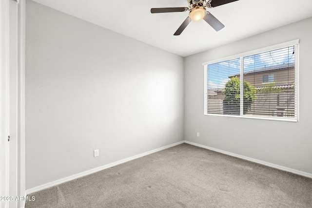18740 W San Juan Ave, Litchfield Park, AZ 85340 - carpeted empty room with baseboards and a ceiling fan