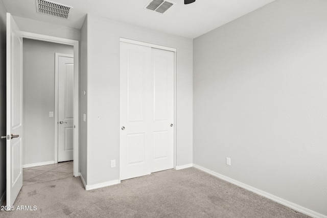 18740 W San Juan Ave, Litchfield Park, AZ 85340 - unfurnished bedroom featuring carpet, baseboards, and a closet