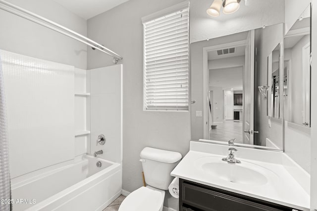 18740 W San Juan Ave, Litchfield Park, AZ 85340 - bathroom featuring toilet,  shower combination, and vanity