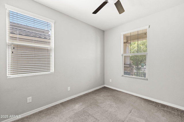 18740 W San Juan Ave, Litchfield Park, AZ 85340 - spare room featuring carpet floors, ceiling fan, and baseboards