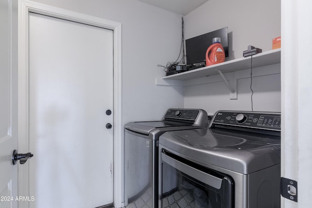 laundry area featuring laundry area and washing machine and dryer