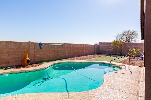 view of pool with a fenced backyard and a fenced in pool