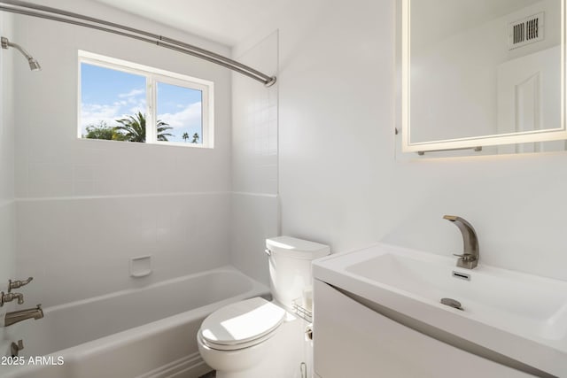 224 N 58th St, Mesa, AZ 85205 - bathroom featuring toilet, tub / shower combination, and vanity