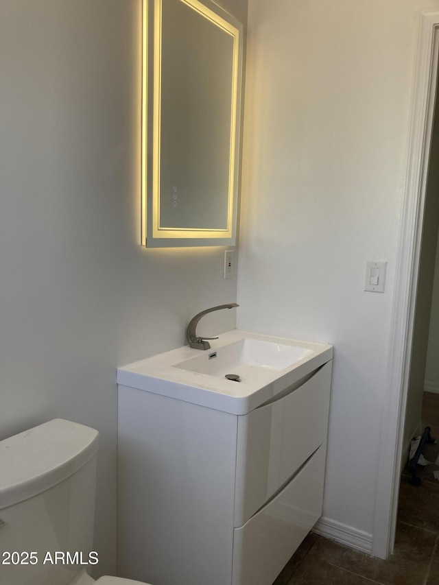 224 N 58th St, Mesa, AZ 85205 - bathroom featuring vanity and toilet