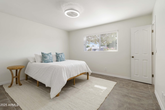224 N 58th St, Mesa, AZ 85205 - bedroom featuring baseboards and tile patterned floors