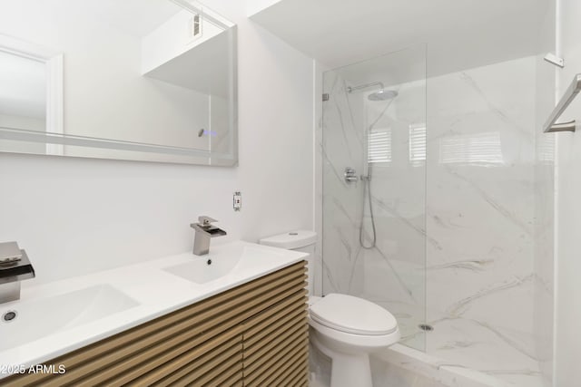 224 N 58th St, Mesa, AZ 85205 - bathroom with toilet, a marble finish shower, and double vanity