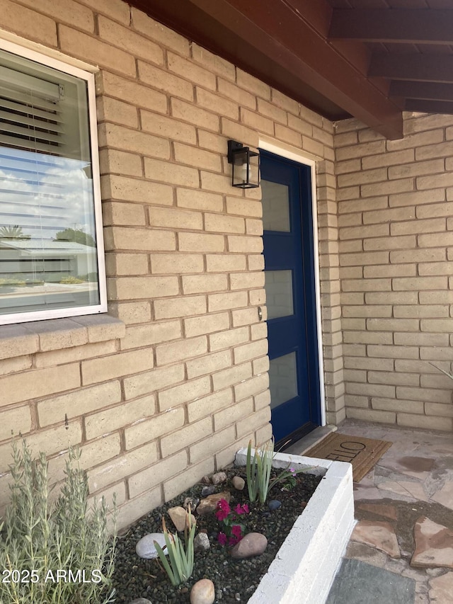 224 N 58th St, Mesa, AZ 85205 - property entrance with brick siding