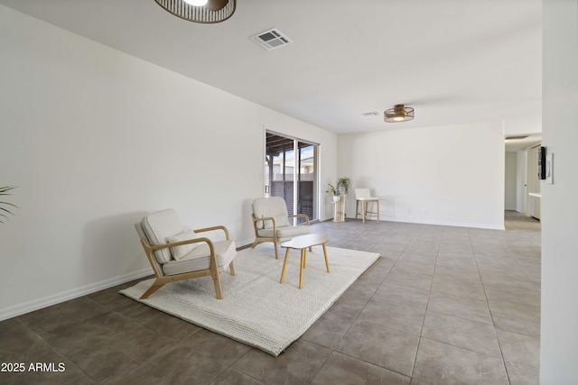 224 N 58th St, Mesa, AZ 85205 - sitting room with baseboards and tile patterned floors